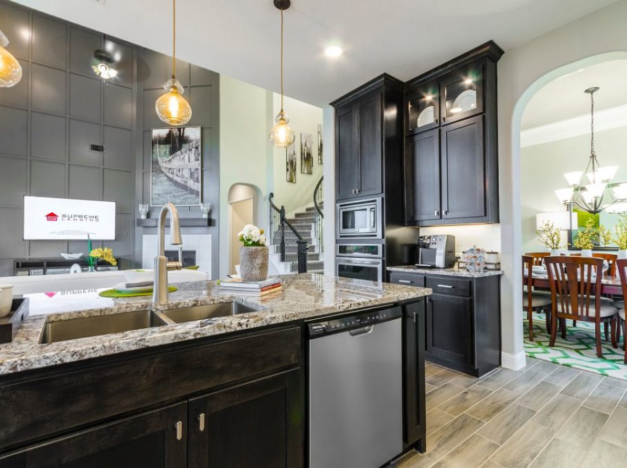 Landon Homes new home builder 432 Carrington Kitchen looking to family room from kitchen island