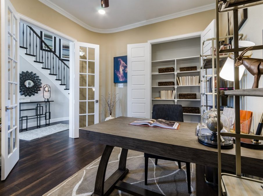 Landon Homes new home builder 432 Carrington Study with large brown stained built-in shelving