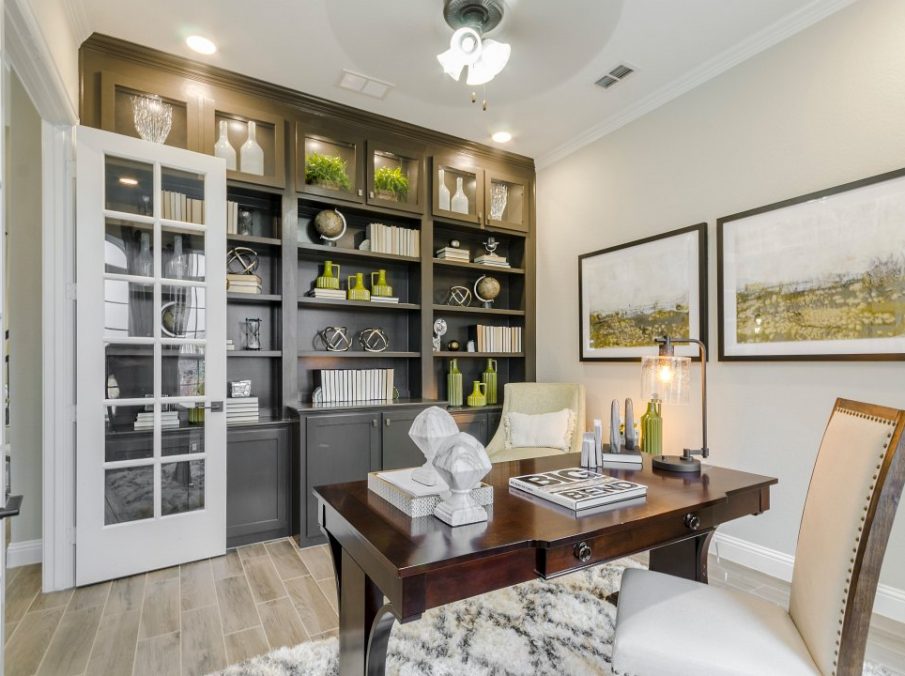Landon Homes new home builder 432 Carrington Study with large brown stained built-in shelving
