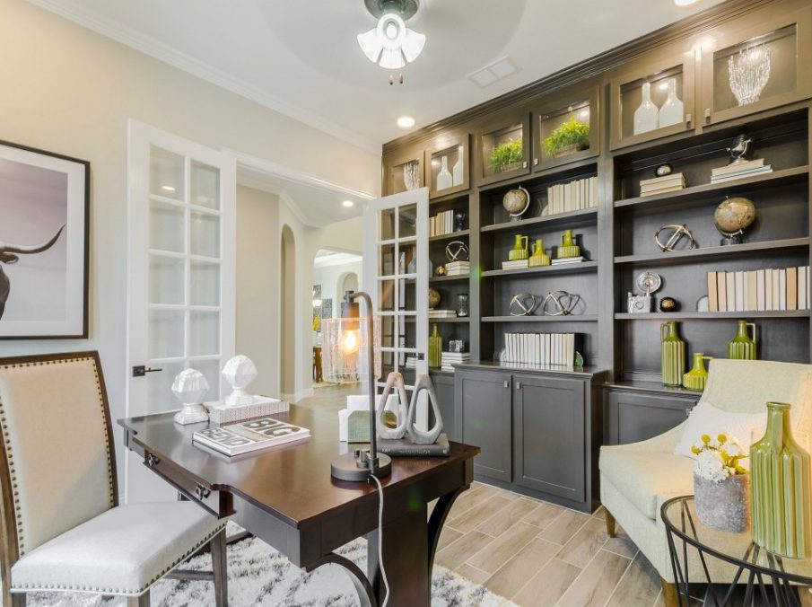 Landon Homes new home builder 432 Carrington Study with large brown stained built-in shelves