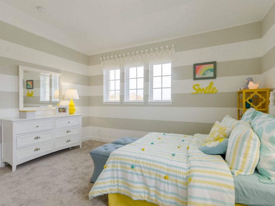 Landon Homes new home builder 432 Carrington Kids Bedroom tan yellow and blue